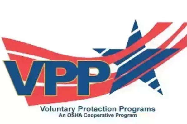 VPP logo with large blue letters, red and blue wavy stripes, and a star. Below it, Voluntary Protection Programs, An OSHA Cooperative Program.